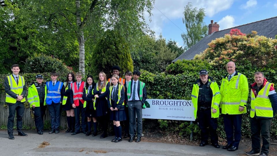 Deputy PCC Andy Pratt MBE with officers, teachers and pupils at Broughton High School